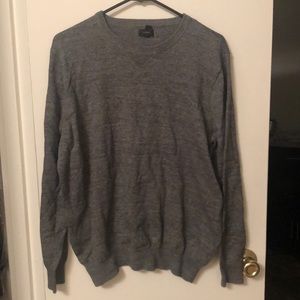 A JCrew grey pullover light sweater.